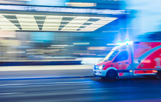 Image of an Ambulance rushing to a hospital