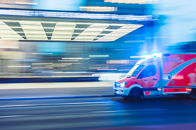 Image of an Ambulance rushing to a hospital