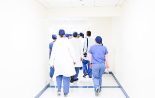 Doctors walking down a hallway together