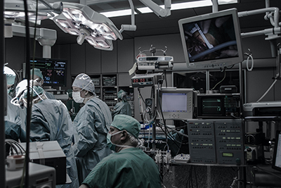 Surgeons in operating room preparing for surgery