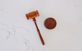 judge's gavel on marble background