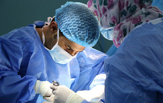 vaginal mesh surgeon operating on a patient