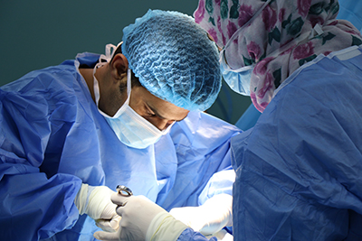 vaginal mesh surgeon operating on a patient