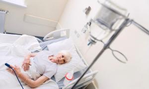 woman in hospital bed, vaginal mesh injury