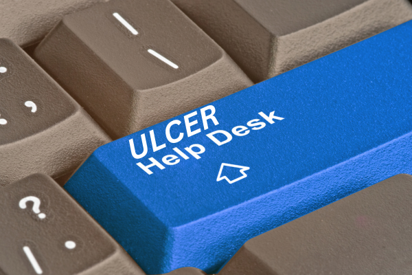 keyboard with words Ulcer Help Desk